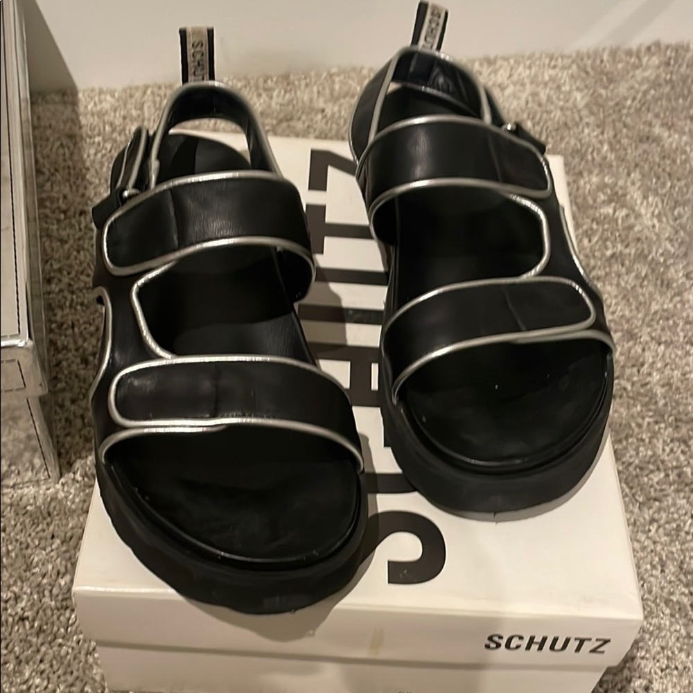 SCHUTZ Black Sandals with Silver Trim into the chunky sandal trend